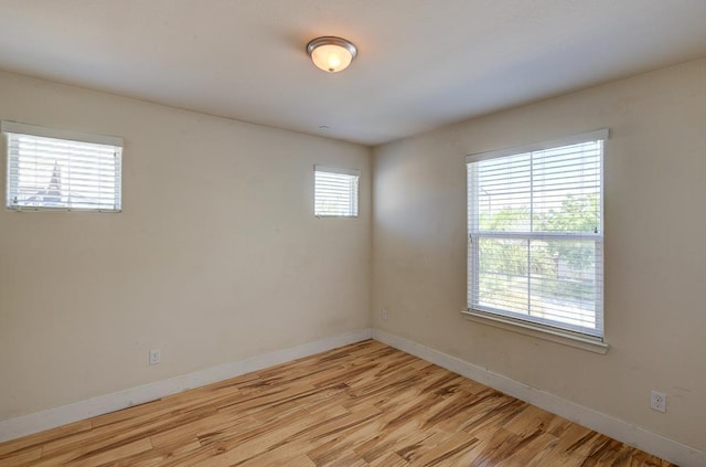 3669 N Clover Ave, Fresno, CA 93727 - unfurnished room with light wood-type flooring and baseboards