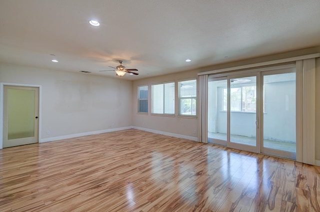 3669 N Clover Ave, Fresno, CA 93727 - empty room featuring ceiling fan, light wood-style flooring, and recessed lighting