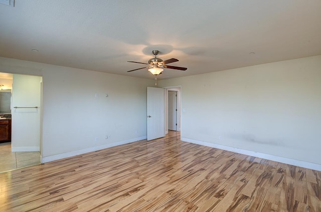 3669 N Clover Ave, Fresno, CA 93727 - spare room featuring light wood finished floors and ceiling fan