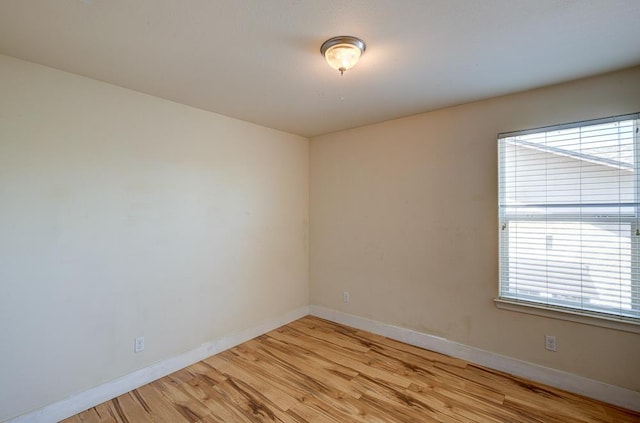 3669 N Clover Ave, Fresno, CA 93727 - unfurnished room featuring light wood-style flooring and baseboards