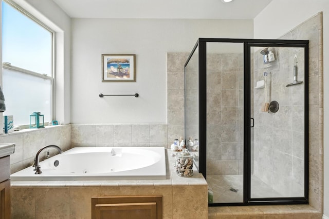 5822 E Booker Ave, Fresno, CA 93727 - full bath with healthy amount of natural light, a whirlpool tub, and a stall shower