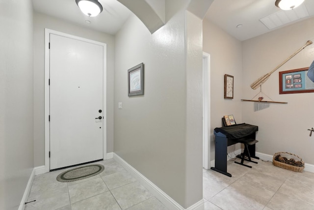 5822 E Booker Ave, Fresno, CA 93727 - entryway with arched walkways and light tile patterned floors