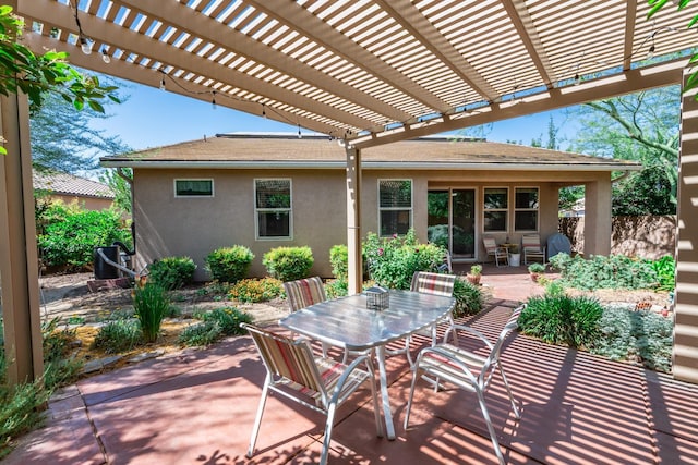 5822 E Booker Ave, Fresno, CA 93727 - view of patio / terrace with outdoor dining space and a pergola