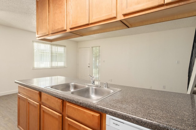 486 W Alamos Ave Unit 3, Clovis, CA 93612 - kitchen featuring light wood-style floors, dishwasher, a textured ceiling, and dark countertops