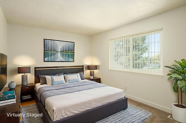 486 W Alamos Ave Unit 3, Clovis, CA 93612 - bedroom with baseboards and carpet floors