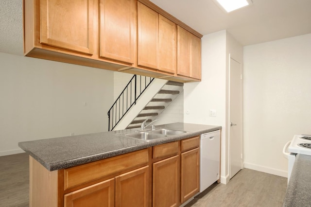 486 W Alamos Ave Unit 3, Clovis, CA 93612 - kitchen with white appliances, light wood-style floors, and dark countertops