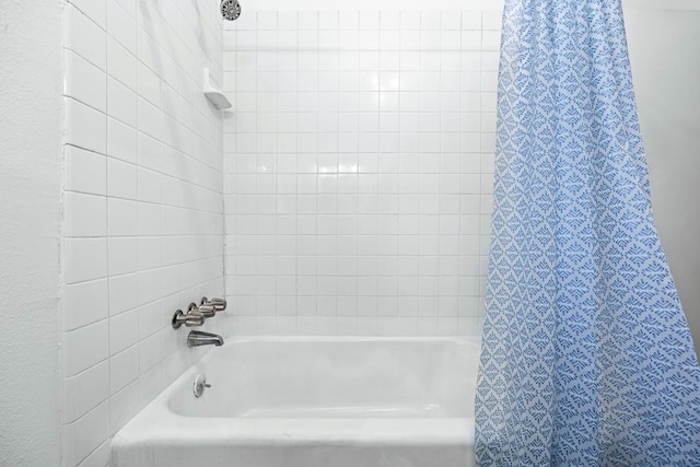 3677 N Thesta St, Fresno, CA 93726 - bathroom featuring shower / bath combination with curtain
