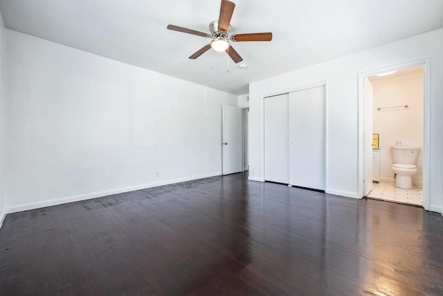 3677 N Thesta St, Fresno, CA 93726 - unfurnished bedroom featuring dark wood-type flooring, a closet, ceiling fan, and ensuite bathroom