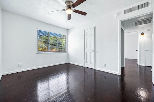 3677 N Thesta St, Fresno, CA 93726 - unfurnished bedroom with wood finished floors, a ceiling fan, a closet, and a textured ceiling