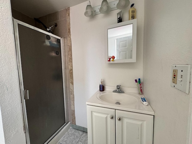 1925 E 15th, Oakland, CA 94606 - full bathroom with a stall shower, vanity, and tile patterned floors
