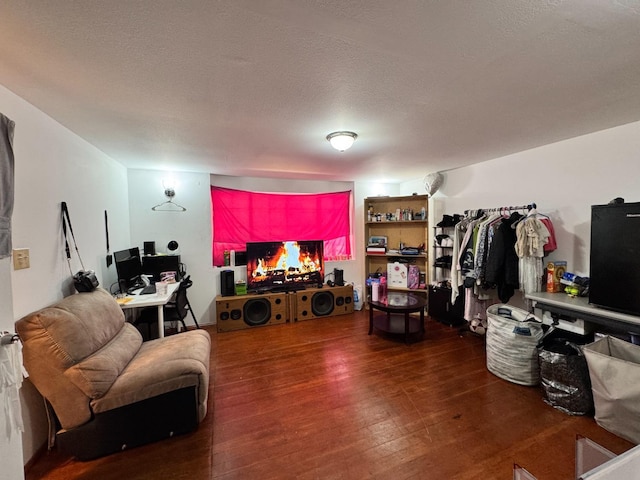 1925 E 15th, Oakland, CA 94606 - living room with hardwood / wood-style floors and a textured ceiling