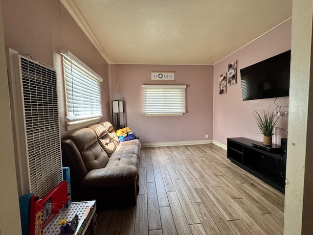 1925 E 15th, Oakland, CA 94606 - living room featuring a heating unit and wood finished floors