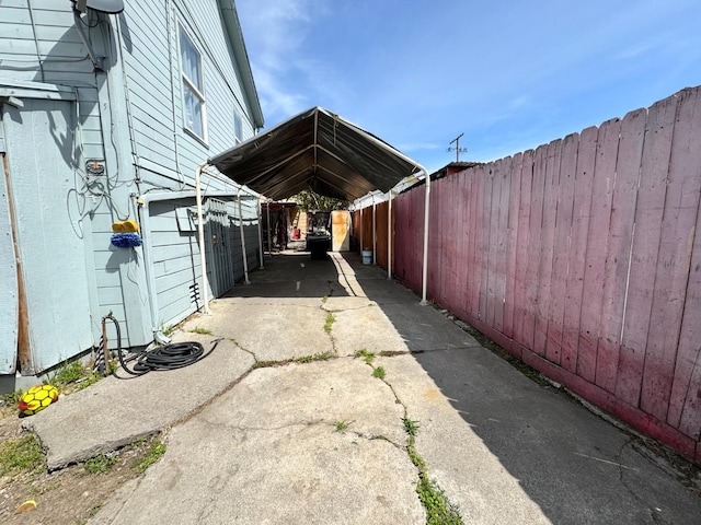 1925 E 15th, Oakland, CA 94606 - view of parking / parking lot with a detached carport and driveway