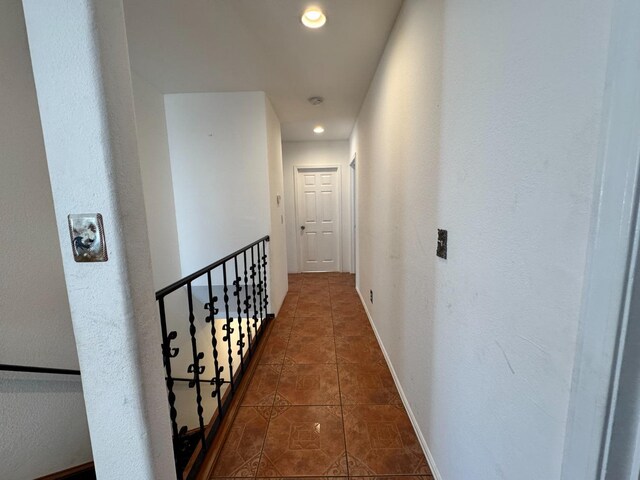 1925 E 15th, Oakland, CA 94606 - hallway featuring tile patterned floors, recessed lighting, and an upstairs landing