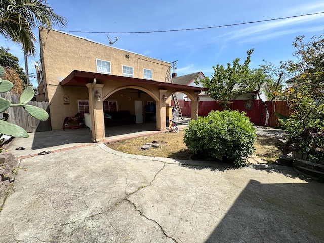 1925 E 15th, Oakland, CA 94606 - back of house featuring stucco siding and a patio area