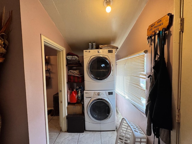 1925 E 15th, Oakland, CA 94606 - laundry room featuring stacked washer / drying machine and light tile patterned floors