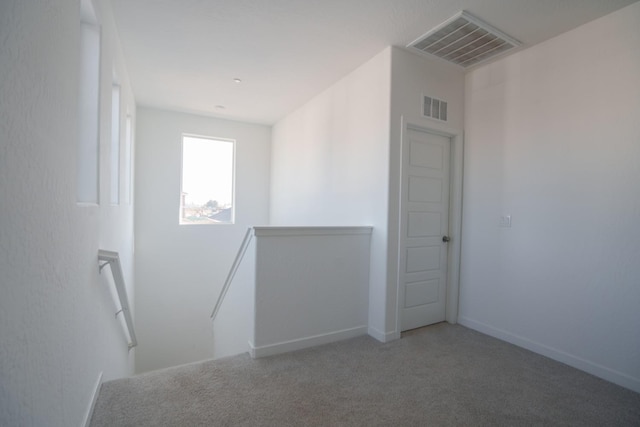 5769 W Austin Way, Fresno, CA 93722 - staircase featuring carpet floors and baseboards