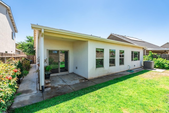 2456 Junipero Ave, Clovis, CA 93619 - rear view of house with stucco siding and a patio area