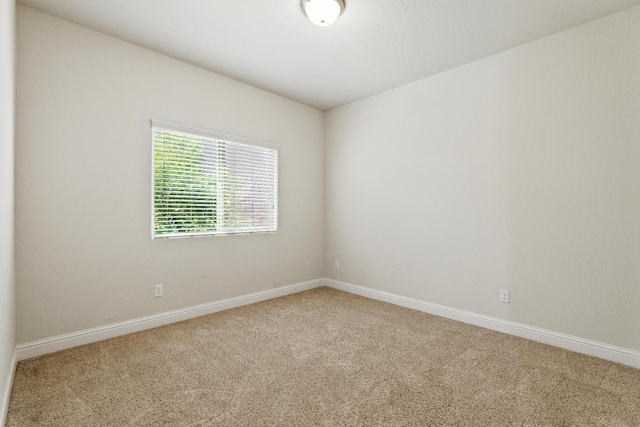 2456 Junipero Ave, Clovis, CA 93619 - carpeted empty room with baseboards