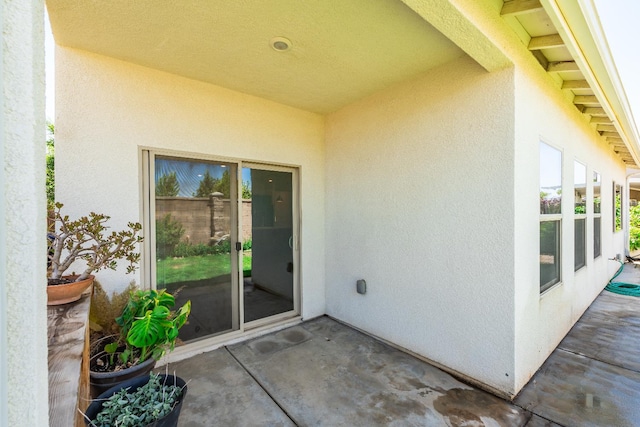 2456 Junipero Ave, Clovis, CA 93619 - property entrance with stucco siding and a patio area