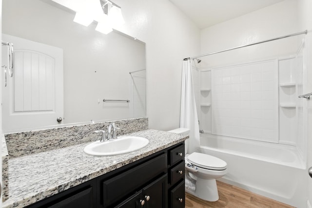 2456 Junipero Ave, Clovis, CA 93619 - full bath featuring wood finished floors, vanity, and shower / tub combo with curtain