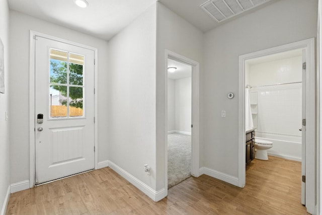 2456 Junipero Ave, Clovis, CA 93619 - doorway featuring light wood finished floors and baseboards