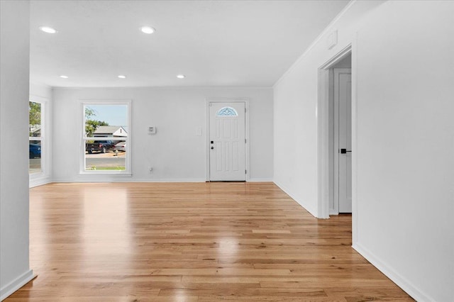 45 E Sussex Way, Fresno, CA 93704 - foyer featuring light wood-style flooring, recessed lighting, and ornamental molding