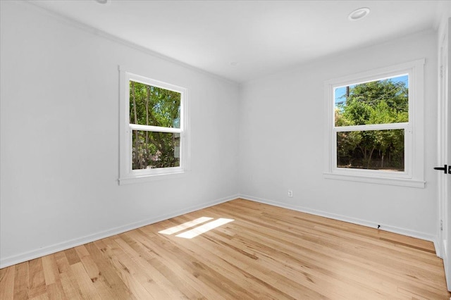 45 E Sussex Way, Fresno, CA 93704 - unfurnished room with plenty of natural light and light wood finished floors