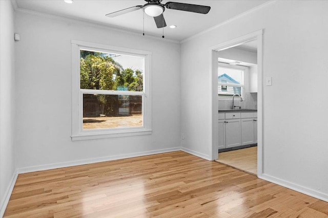 45 E Sussex Way, Fresno, CA 93704 - unfurnished room with a ceiling fan, crown molding, light wood finished floors, and recessed lighting