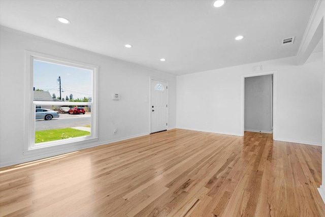 45 E Sussex Way, Fresno, CA 93704 - unfurnished living room with recessed lighting and light wood finished floors