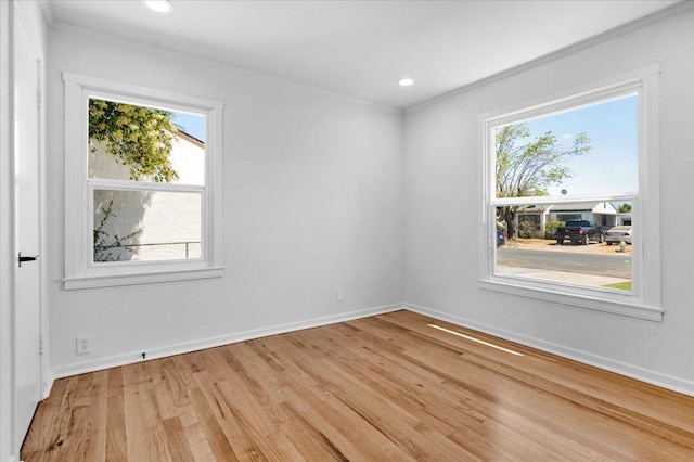 45 E Sussex Way, Fresno, CA 93704 - unfurnished room with crown molding, light wood-style flooring, and recessed lighting