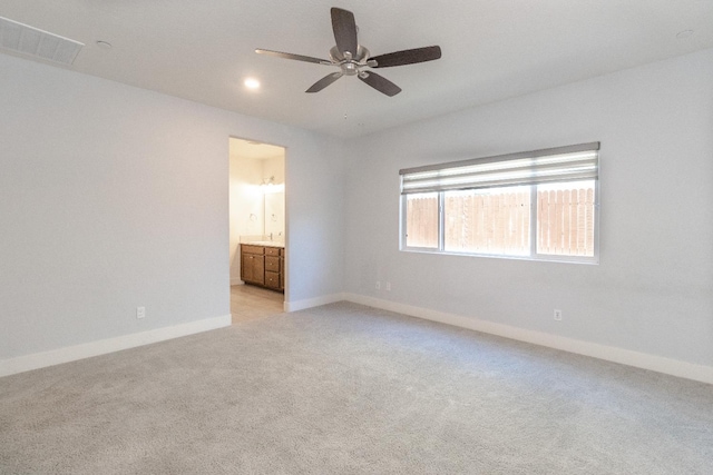 153 N Bliss Ave, Fresno, CA 93727 - unfurnished room with a ceiling fan and light colored carpet