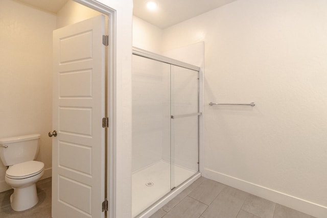 153 N Bliss Ave, Fresno, CA 93727 - full bathroom featuring a shower stall and tile patterned flooring
