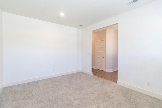 153 N Bliss Ave, Fresno, CA 93727 - spare room featuring light carpet and recessed lighting