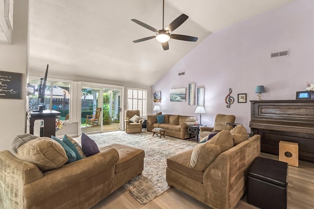 1785 E Portland Ave, Fresno, CA 93720 - living room featuring wood finished floors, a ceiling fan, and high vaulted ceiling