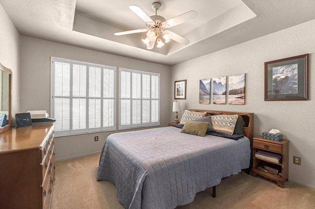 1785 E Portland Ave, Fresno, CA 93720 - bedroom featuring light carpet, a raised ceiling, and ceiling fan