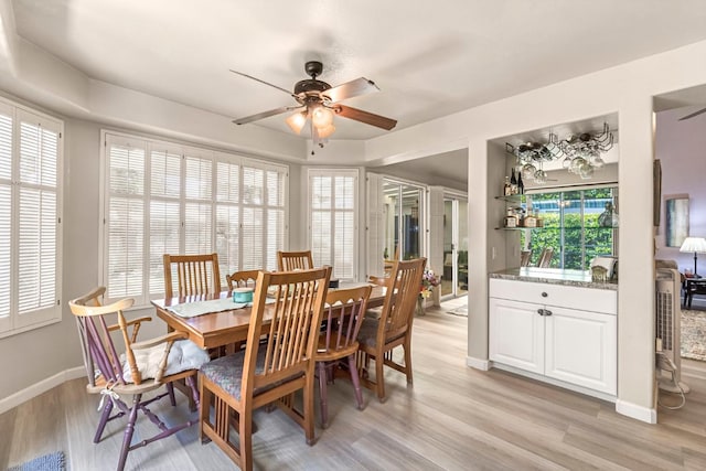 1785 E Portland Ave, Fresno, CA 93720 - dining room featuring a ceiling fan and light wood-style floors