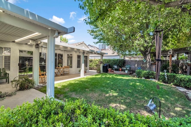 1785 E Portland Ave, Fresno, CA 93720 - fenced backyard featuring a patio area
