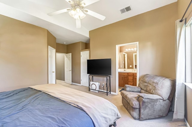 205 N Douglas Ave, Fresno, CA 93727 - bedroom with light carpet, ensuite bathroom, and ceiling fan