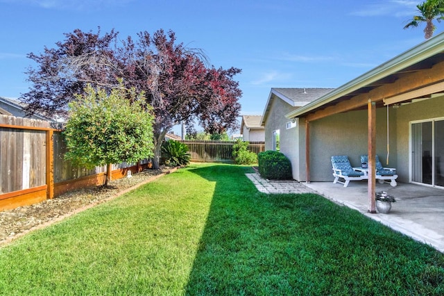 205 N Douglas Ave, Fresno, CA 93727 - fenced backyard with a patio