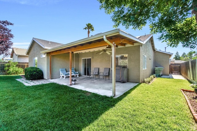 205 N Douglas Ave, Fresno, CA 93727 - rear view of property with stucco siding, a ceiling fan, a fenced backyard, a patio, and a shingled roof
