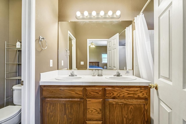 205 N Douglas Ave, Fresno, CA 93727 - full bath featuring a ceiling fan and double vanity