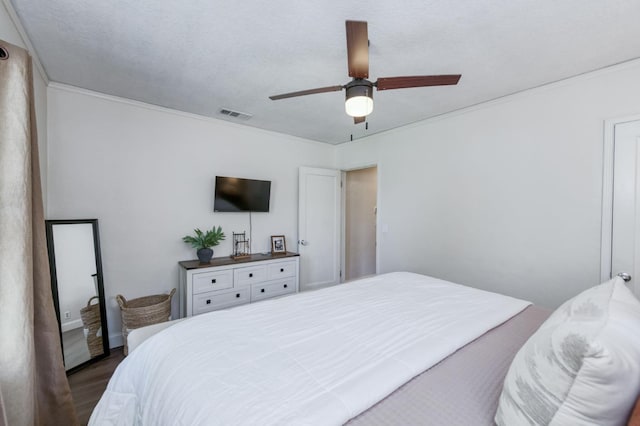 3054 E Brown Ave, Fresno, CA 93703 - bedroom featuring dark wood-style floors, ornamental molding, and ceiling fan