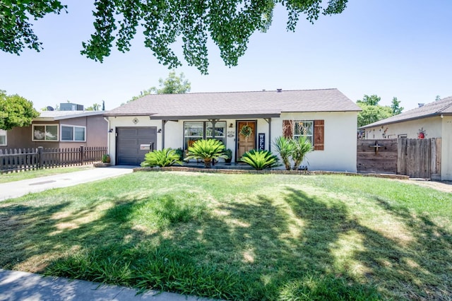 3054 E Brown Ave, Fresno, CA 93703 - single story home with a garage, stucco siding, and driveway