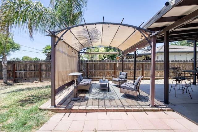 3054 E Brown Ave, Fresno, CA 93703 - fenced backyard with an outdoor living space and a wooden deck