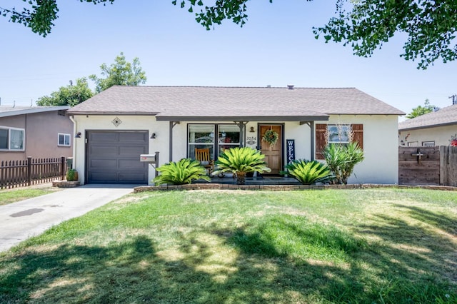 3054 E Brown Ave, Fresno, CA 93703 - view of front of house featuring an attached garage, stucco siding, driveway, and a shingled roof
