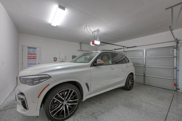 1363 E Via Prato Dr, Fresno, CA 93730 - garage featuring a garage door opener