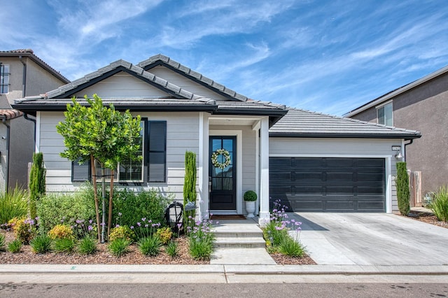 1363 E Via Prato Dr, Fresno, CA 93730 - single story home with an attached garage, driveway, and a tile roof