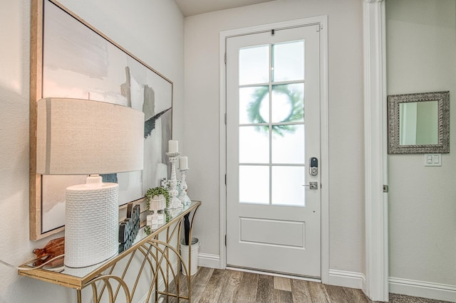 1363 E Via Prato Dr, Fresno, CA 93730 - doorway with wood finished floors and baseboards