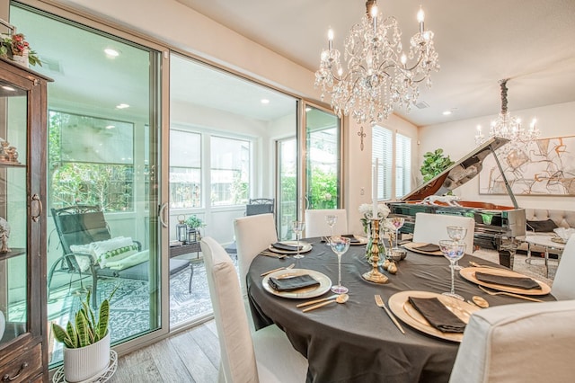 1363 E Via Prato Dr, Fresno, CA 93730 - dining area featuring a chandelier, wood finished floors, and recessed lighting